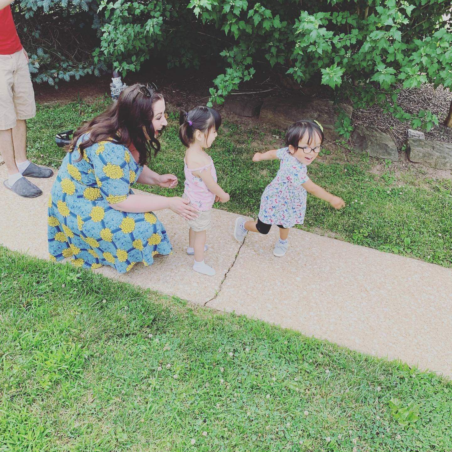 Sisters adopted from China reunite outside Philadelphia