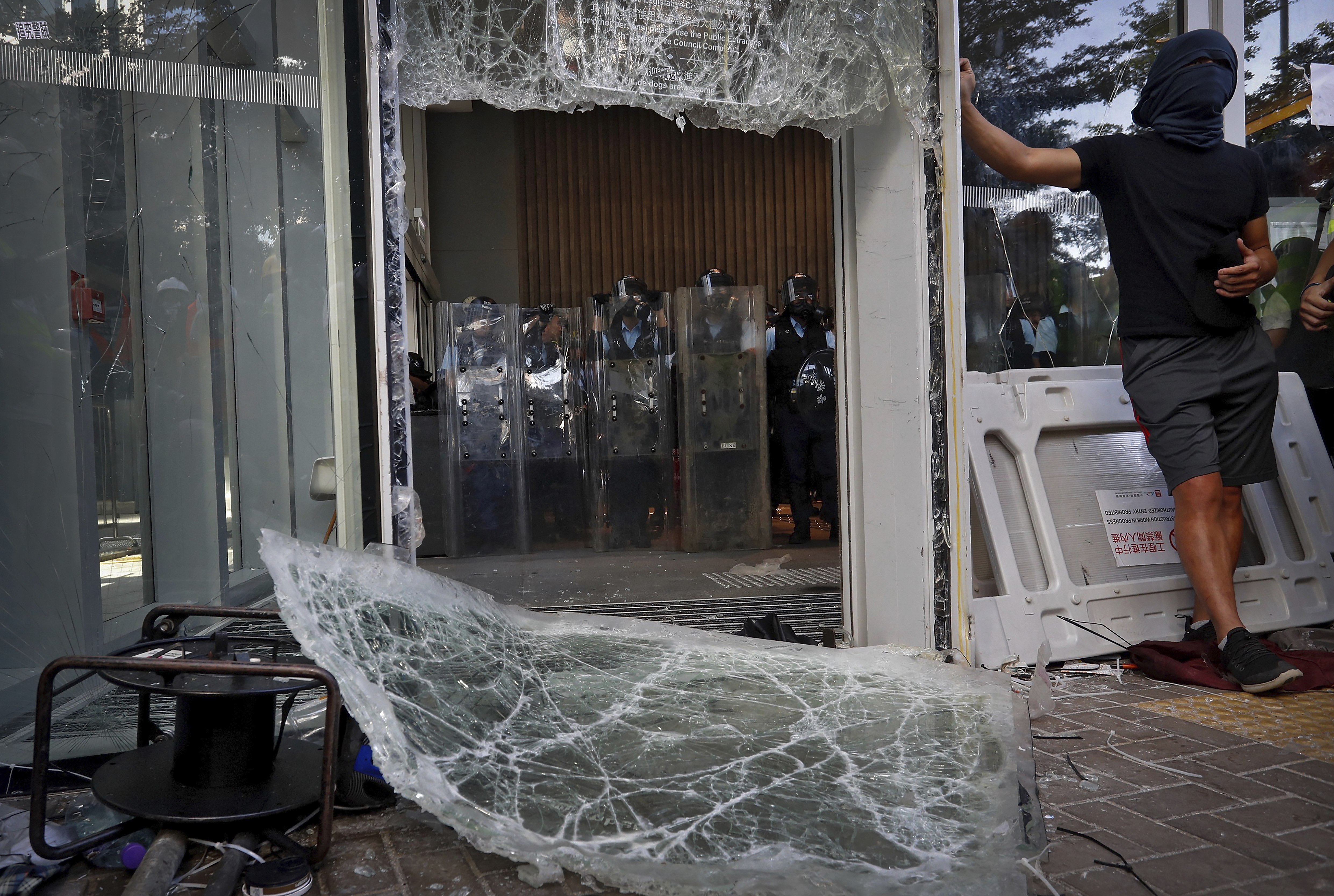 Protesters attack Hong Kong legislature on annivesary of handover