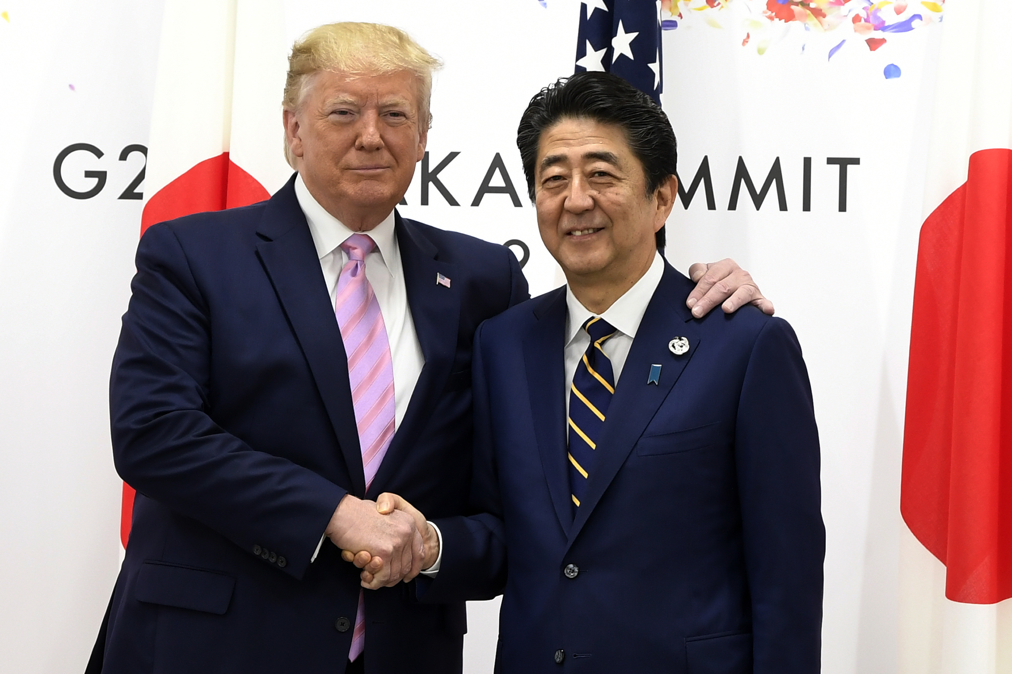 In Japan, Trump pushes allies on trade before meeting Putin
